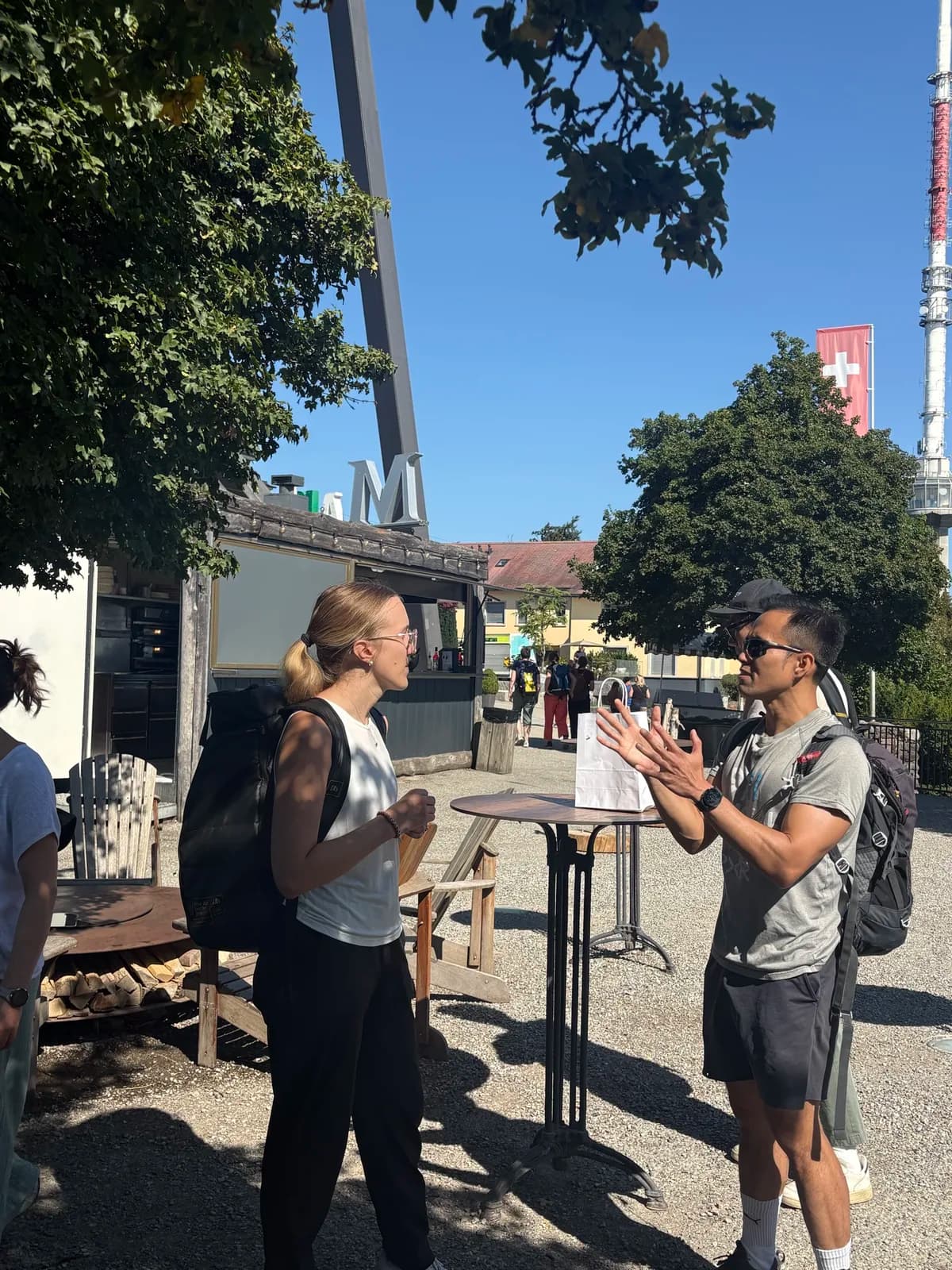 Participants in conversation on the morning hike up the Uetliberg